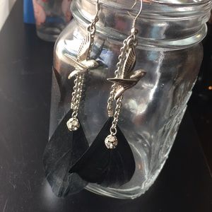 Black feather dangle earrings